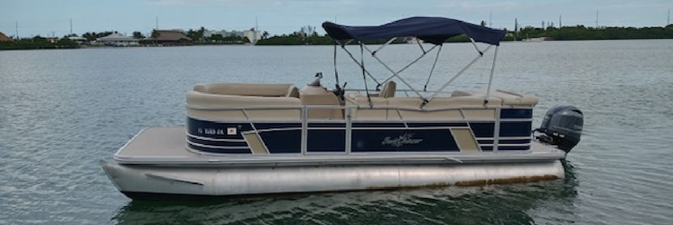 Dusky Rental Boat on Water